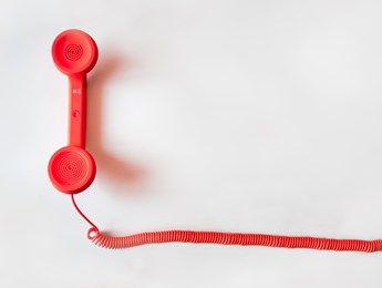A bright red telephone